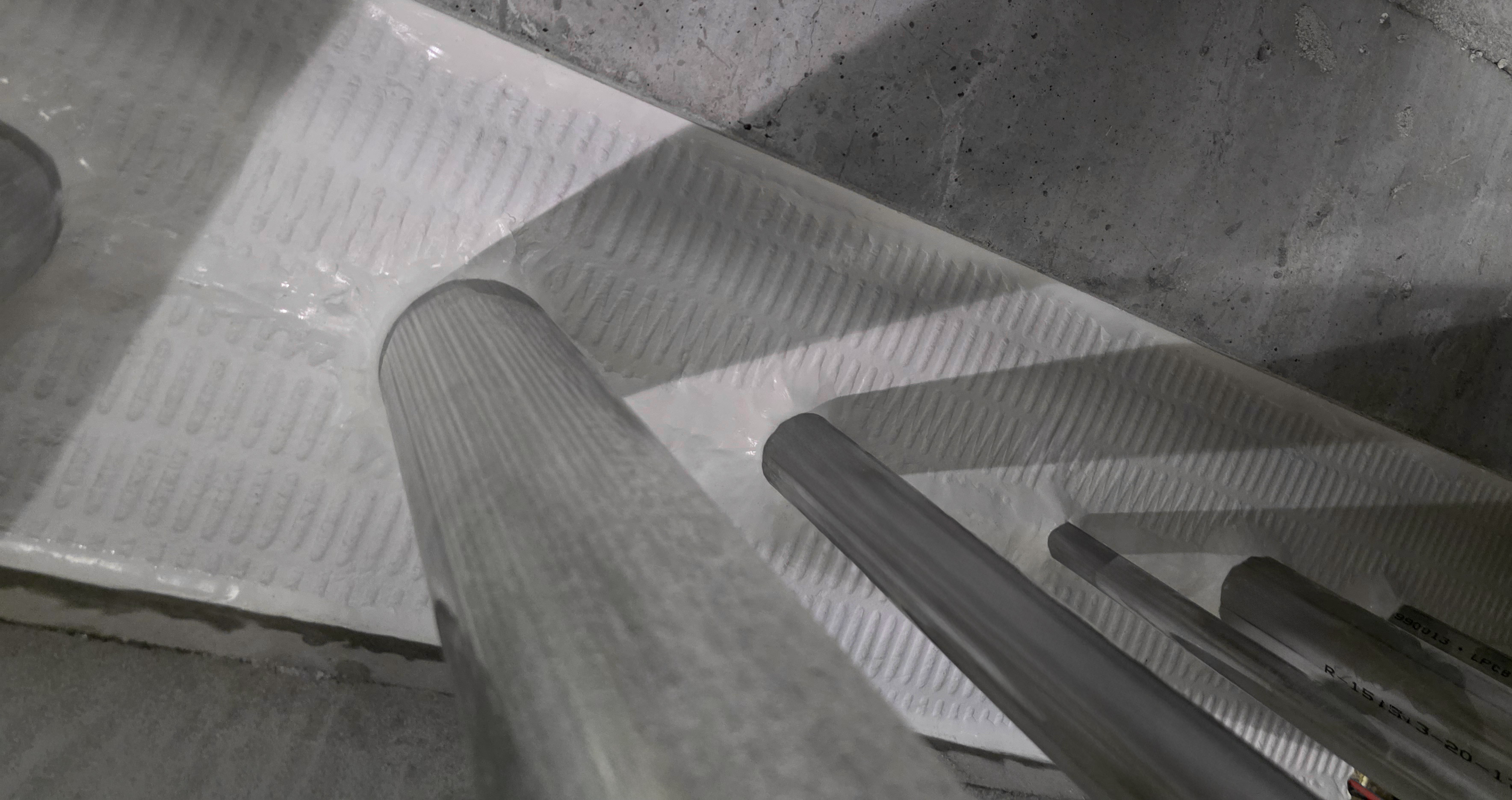 Fire sealing plate around pipes