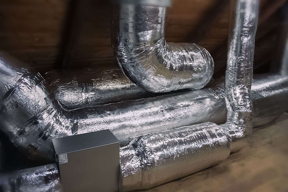 Ventilation duct fire insulation with wire mat as the base layer and lamella glass wool installed on top for full fire protection.